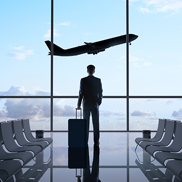 Shutterstock image: traveling businessman in an airport.