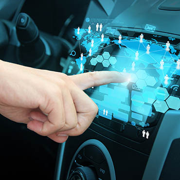 Shutterstock image (by My Life Graphic): Pushing a touch screen interface in a vehicle. 